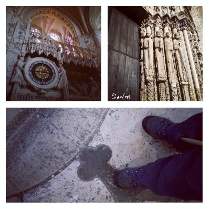 Interior view of the Cathedrale of Chartres, showcasing stained glass windows and intricate stonework.